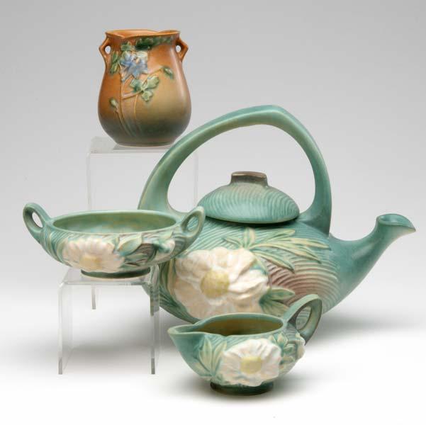 Appraisal: ROSEVILLE Three-piece green Peony tea set with a brown Columbine