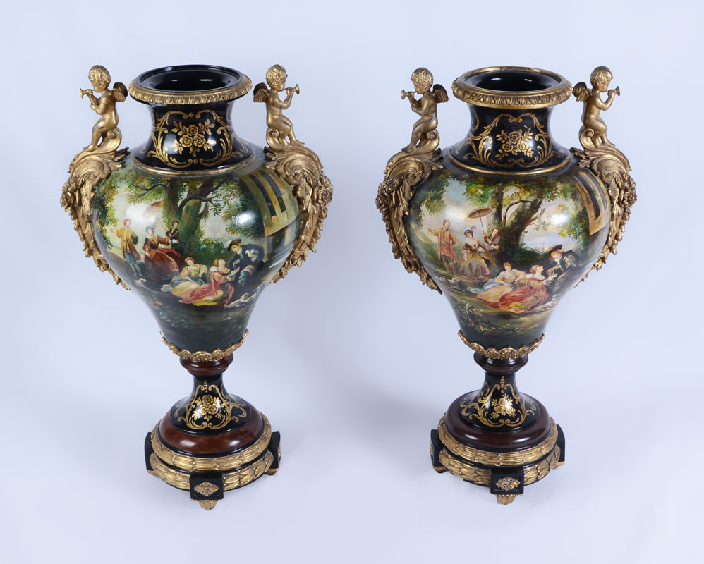 Appraisal: PAIR OF LARGE HAND PAINTED HANDLED URNS Pair of decorative