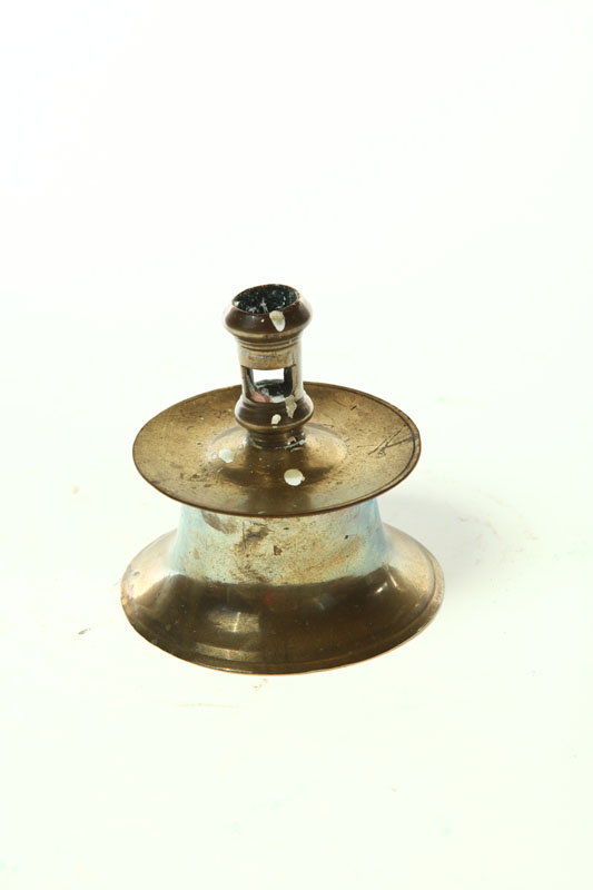 Appraisal: BRASS CAPSTAN CANDLESTICK European th century Socket has ejector hole