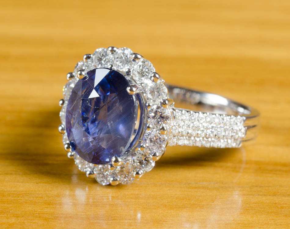 Appraisal: SAPPHIRE DIAMOND AND FOURTEEN KARAT GOLD RING with AIGS appraisal