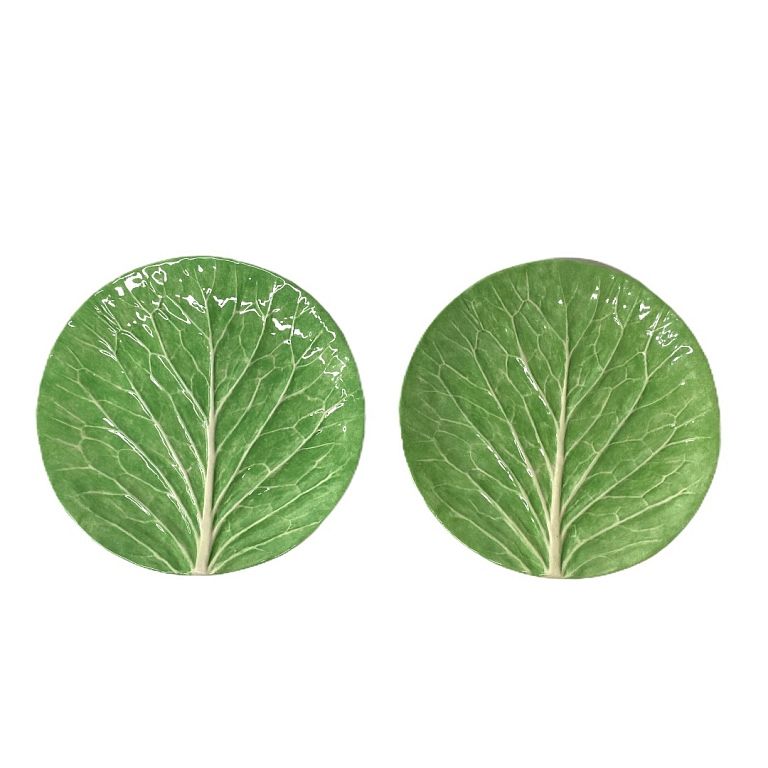 Appraisal: Two Dodie Thayer signed lettuce plates Two Dodie Thayer signed