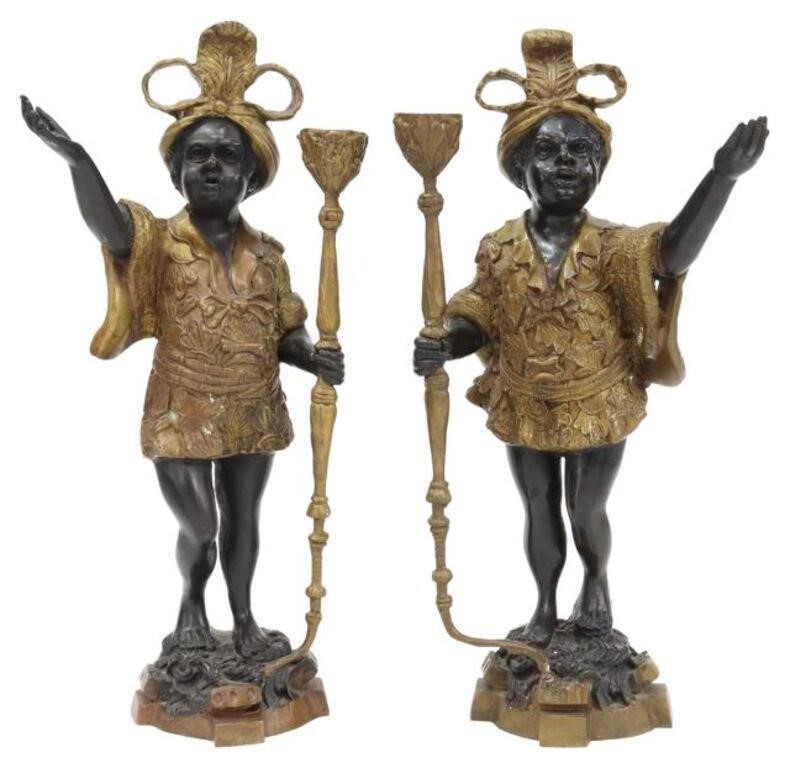 Appraisal: pair Parcel gilt and patinated bronze Blackamoor candle holders th