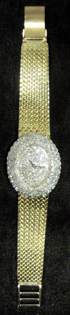 Appraisal: Lady's karat yellow gold wristwatch Oval cased diamond face displaying