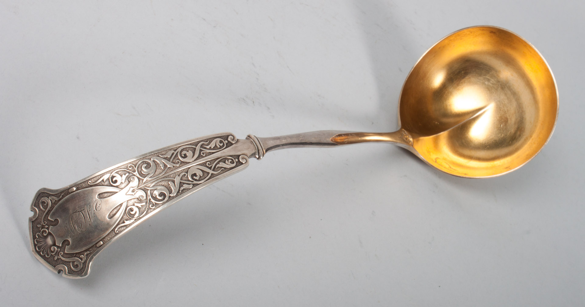 Appraisal: Etruscan Revival sterling silver gilt ladle circa H Semken retailer