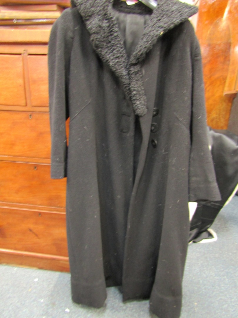 Appraisal: A 's ladies black overcoat with lambs wool collar