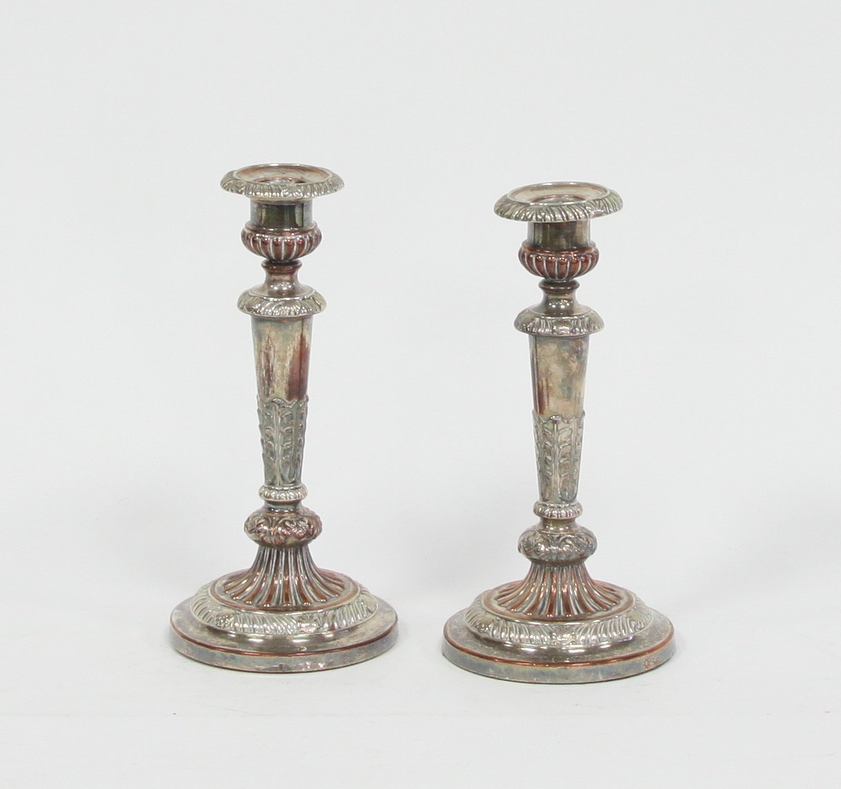 Appraisal: A pair of Sheffield plate candlesticks Matthew Boulton cm high