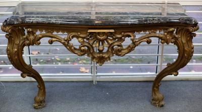 Appraisal: A th Century carved wood and gilt serpentine pier table