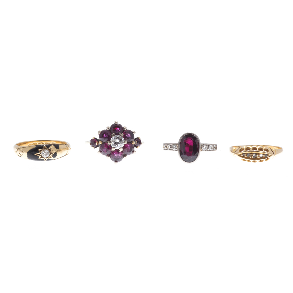 Appraisal: A synthetic ruby and diamond set cluster ring claw set