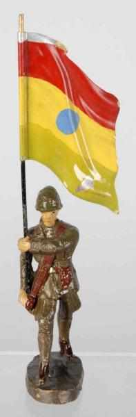 Appraisal: Elastolin cm Flagman with Unknown Flag Composition man with tin