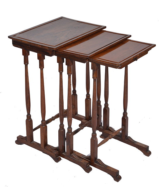 Appraisal: A NEST OF THREE TH CENTURY ROSEWOOD OCCASIONAL TABLES with