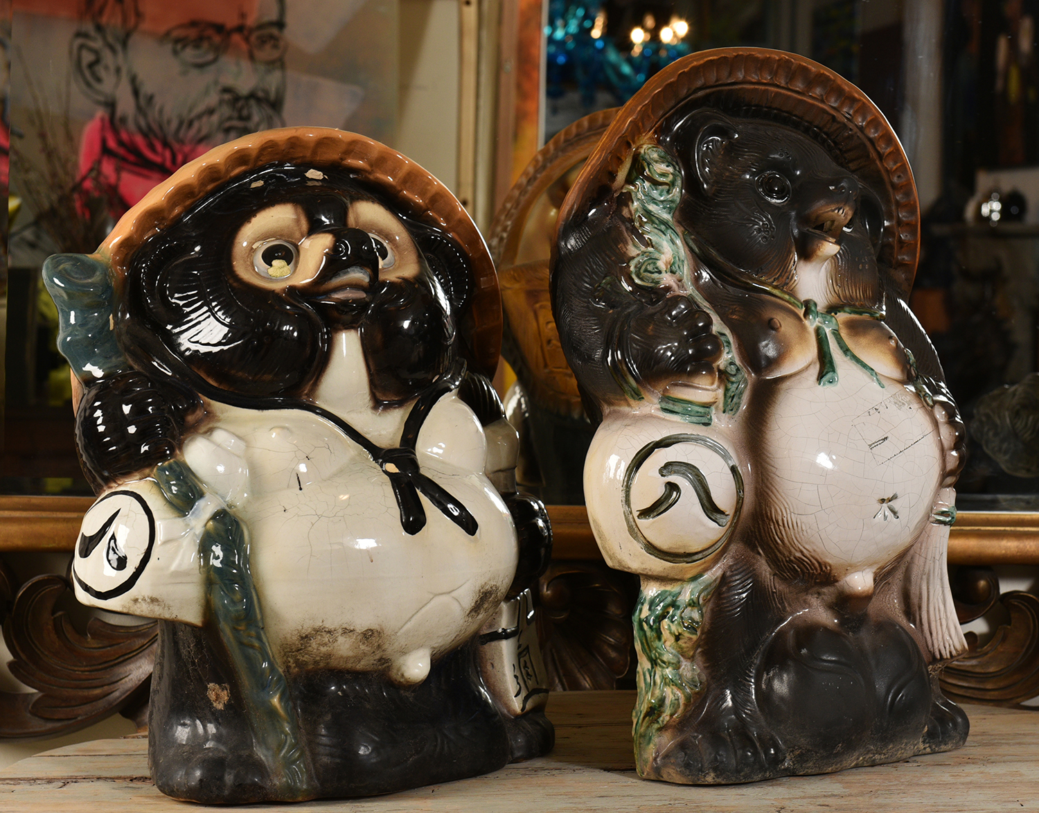 Appraisal: A PAIR OF JAPANESE TANUKI FIGURES minor losses h x