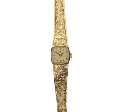 Appraisal: A ladies gold wristwatch by Omega on an integrated ct