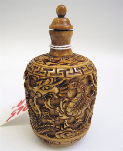 Appraisal: A LARGE IVORY SNUFF MEDICINE BOTTLE hand carved with repeating