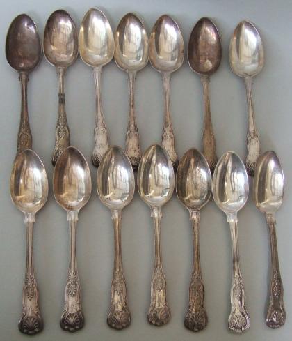 Appraisal: Fourteen silver King's pattern dessert spoons all London comprising six