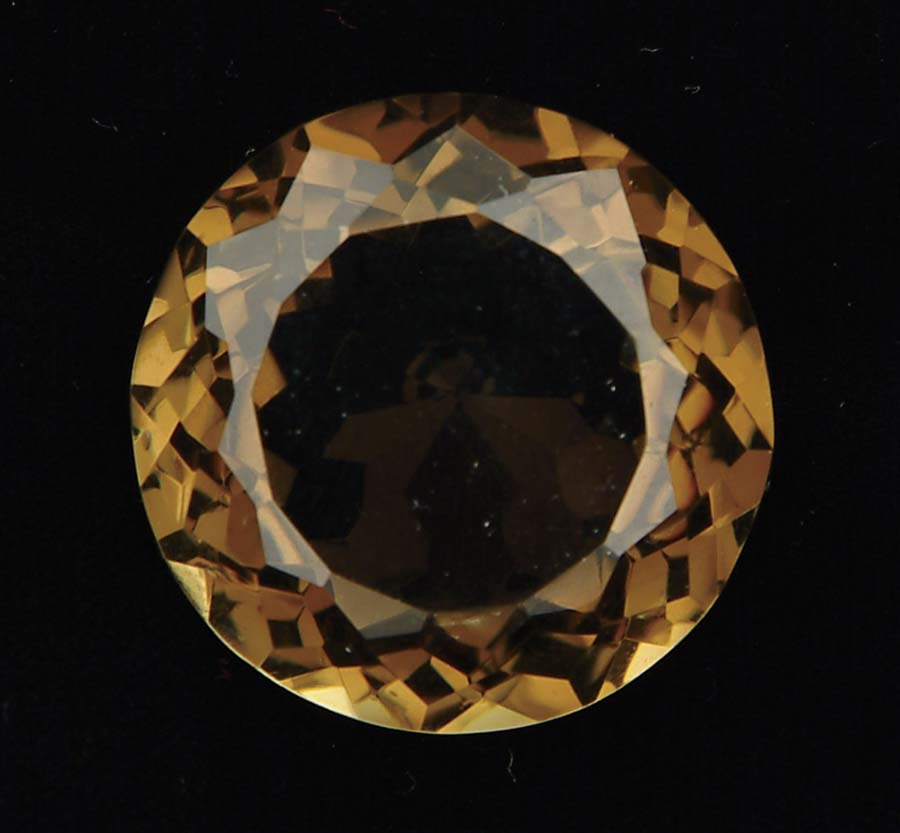 Appraisal: UNMOUNTED LARGE ROUND SMOKEY TOPAZ mm round topaz CONDITION Very