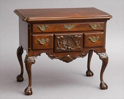 Appraisal: PHILADELPHIA CHIPPENDALE-STYLE CARVED MAHOGANY MINIATURE LOWBOY The case containing one