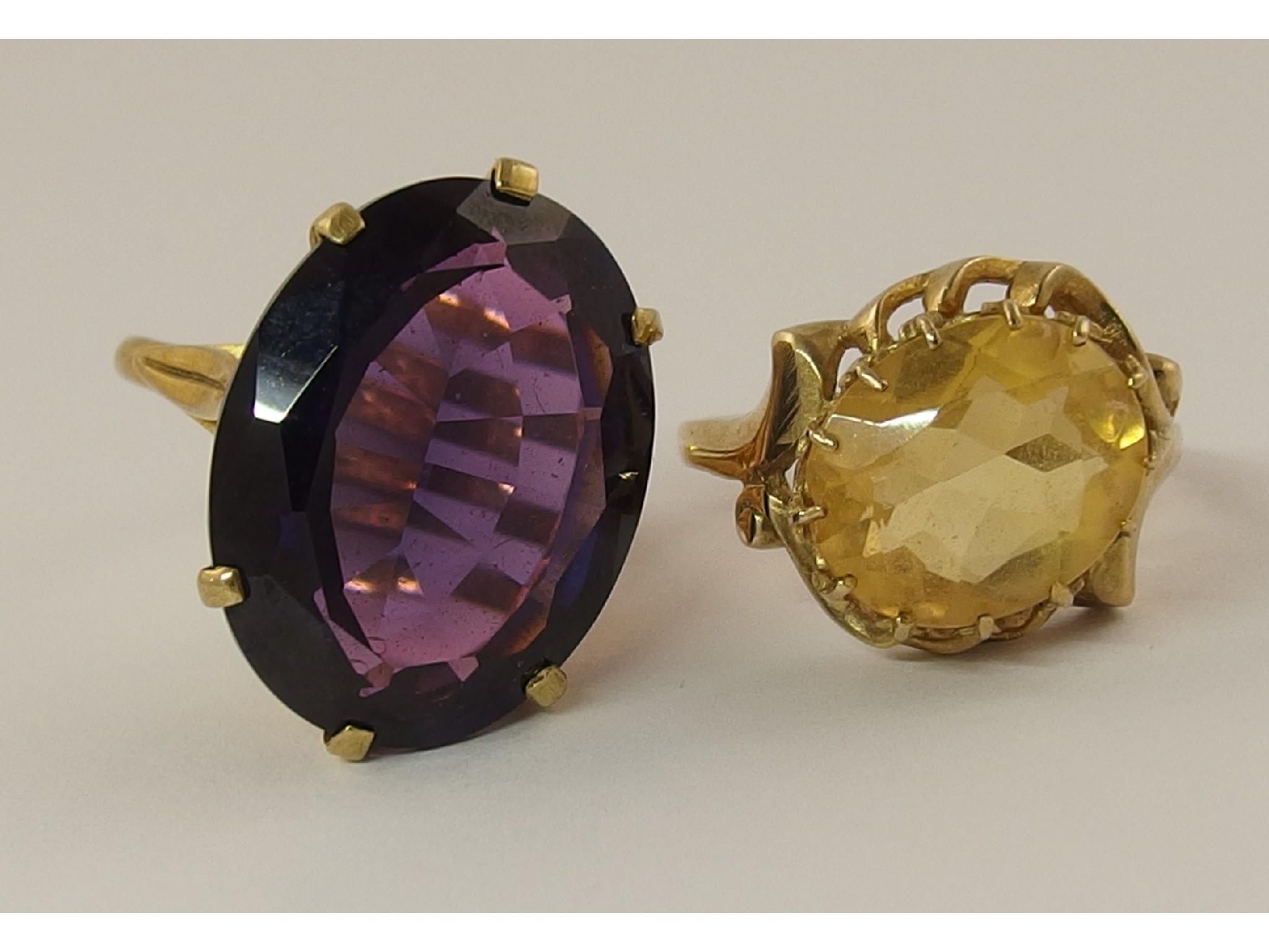 Appraisal: A ct citrine set ring and a ct synthetic amethyst