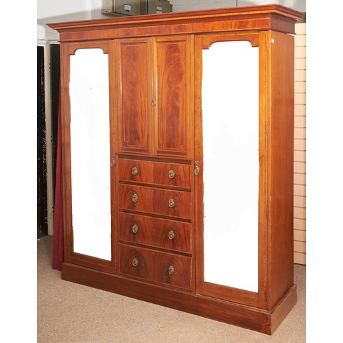 Appraisal: An Edwardian mahogany wardrobe crossbanded in satinwood and line inlaid