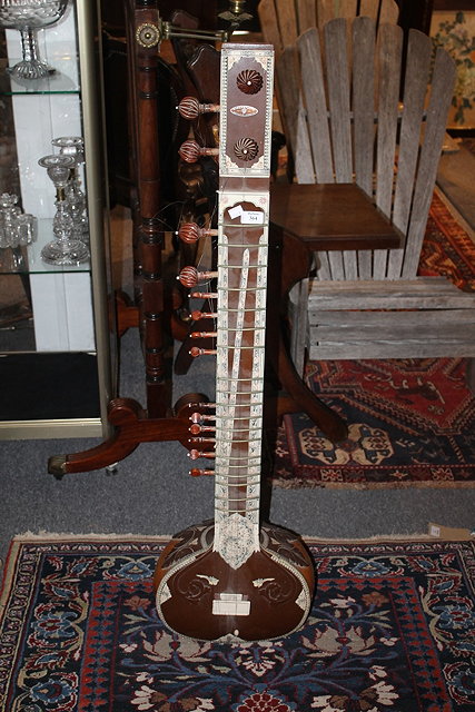 Appraisal: AN INDIAN SITAR a lute type instrument and one other