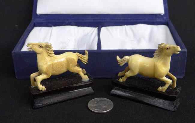 Appraisal: Lot cased Asian ivory horses