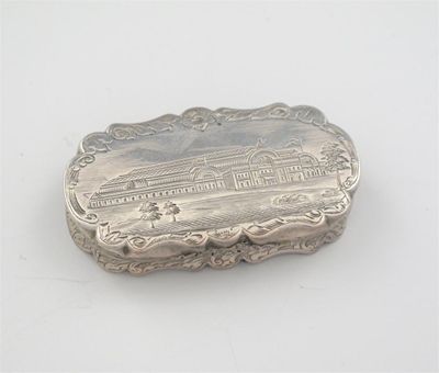 Appraisal: A Victorian engraved 'castletop' vinaigrette of rounded form with shaped