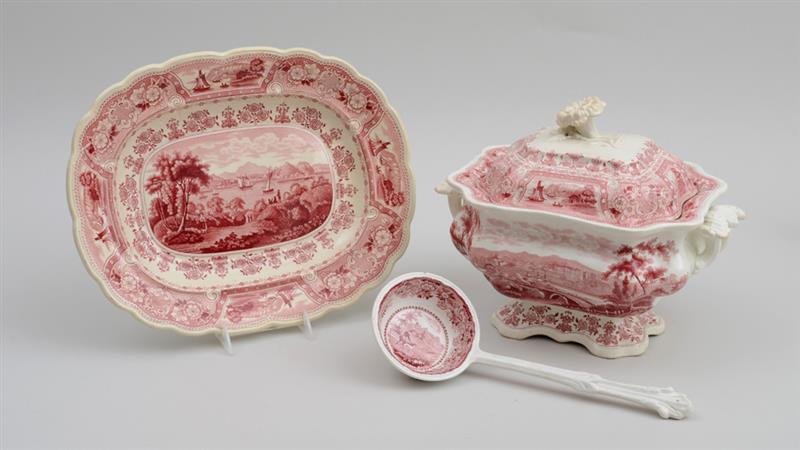 Appraisal: STAFFORDSHIRE RED TRANSFER-PRINTED TUREEN COVER AND STAND IN THE CLYDE