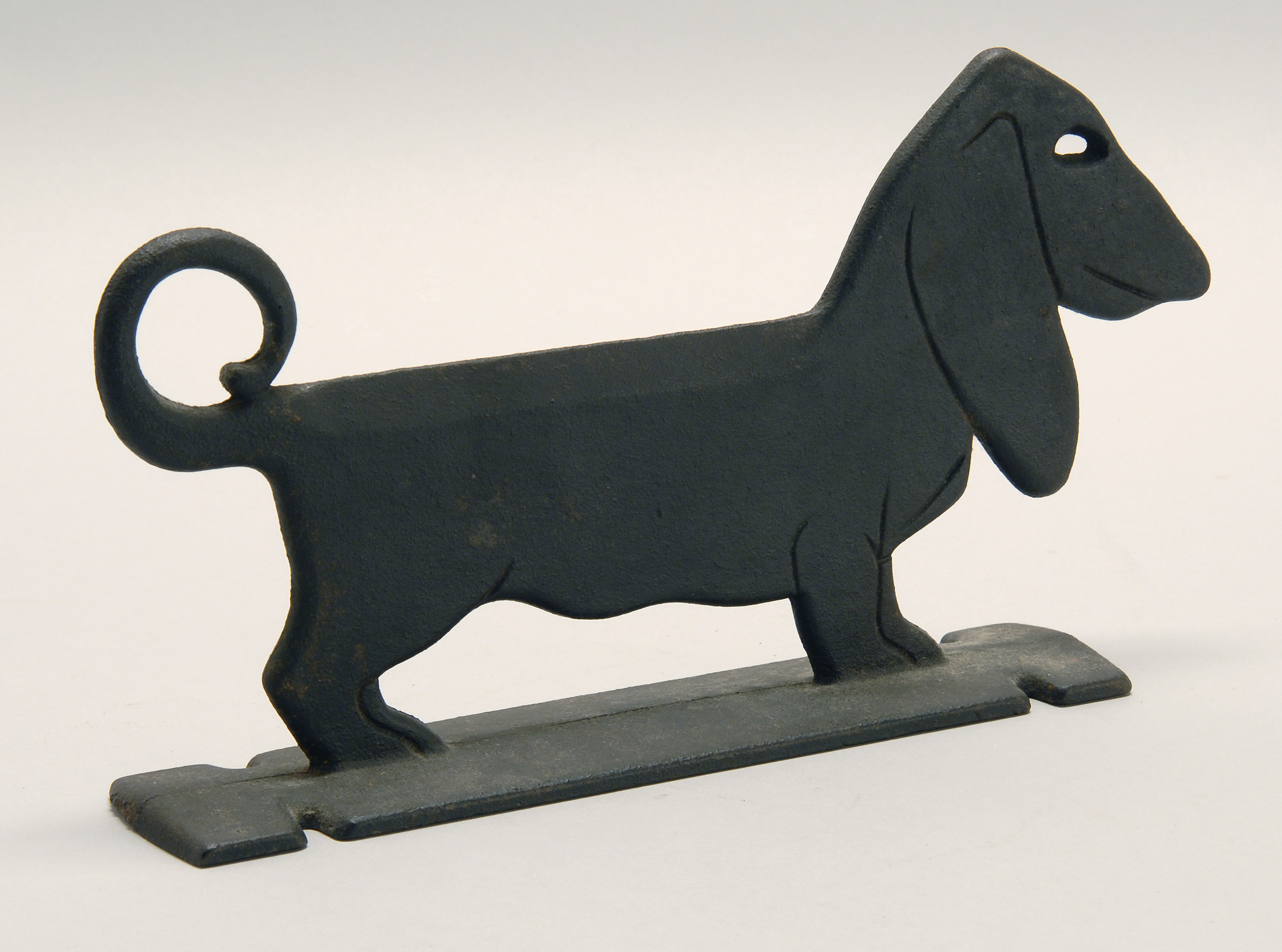 Appraisal: CAST IRON DACHSHUND-FORM BOOT SCRAPER th CenturyPainted black Height Length