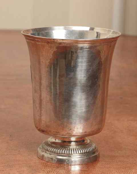 Appraisal: A CONTINENTAL SILVER BEAKER with a plain flared bowl standing