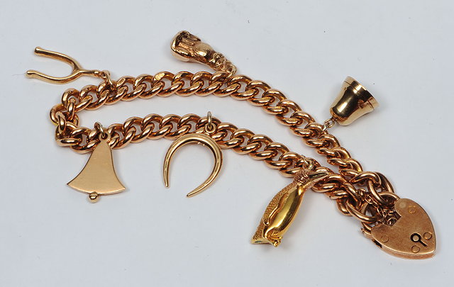 Appraisal: A CT GOLD BRACELET with padlock clasp fitted with a