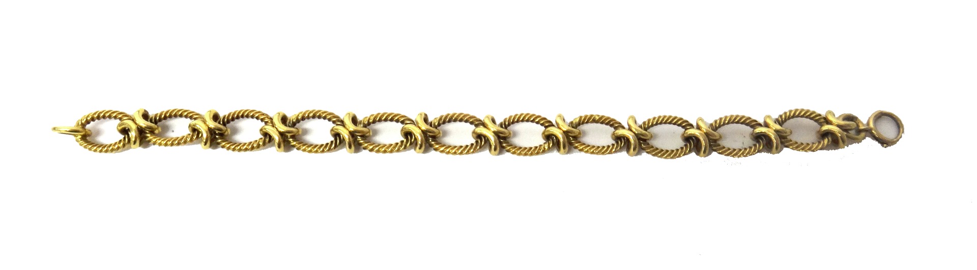 Appraisal: A gold bracelet in a ropetwist oval and knot link