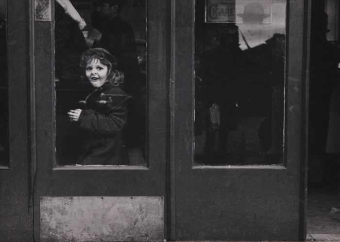 Appraisal: ARTHUR LAVINE GIRL WITH NOSE PRESSED AGAINST GLASS Gelatin silver