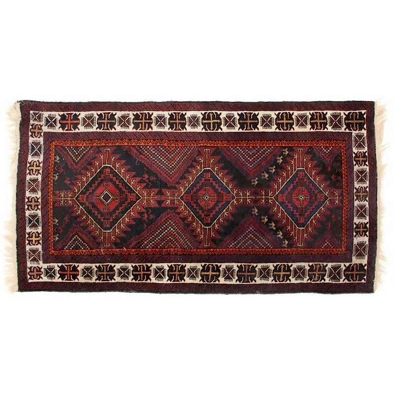 Appraisal: Baluch Area Rug circa wool foundation the dark brown field