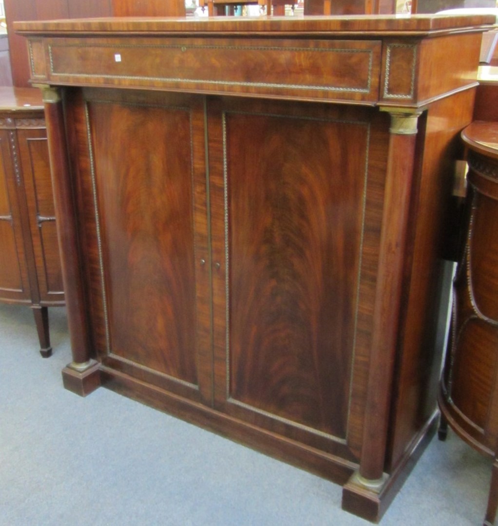 Appraisal: A Regency gilt metal mounted side cabinet with single drawer