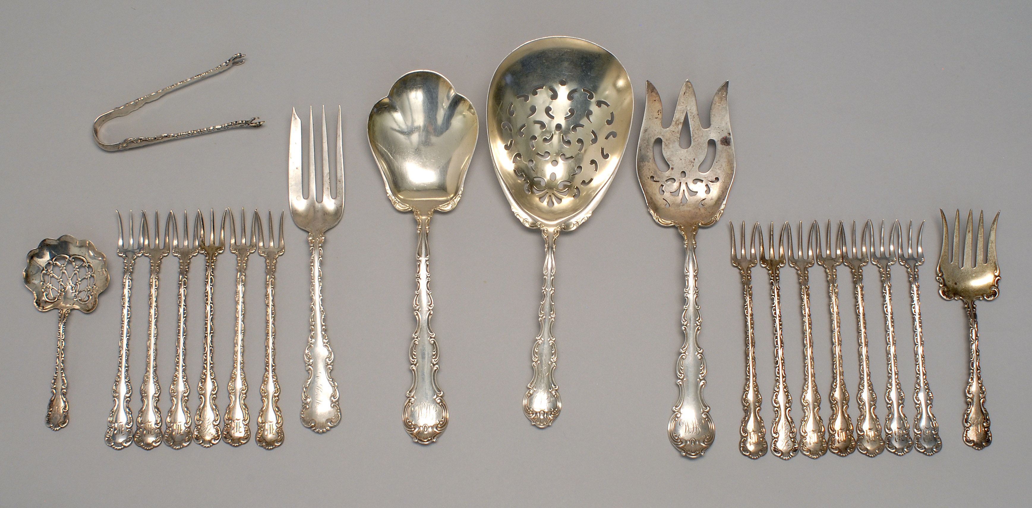 Appraisal: TWENTY PIECES OF AMERICAN STERLING SILVER FLATWARE with various monograms