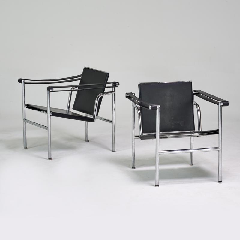 Appraisal: LE CORBUSIER Pair of Basculant LC armchairs s Chromed steel