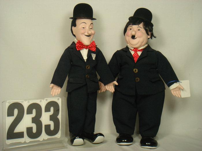 Appraisal: Laurel Hardy Dolls porcelain and cloth inches tall approx no