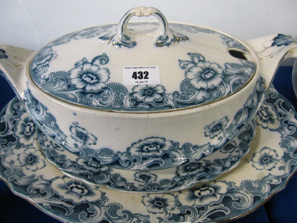 Appraisal: Blue and white pottery dinner set to include two tureens