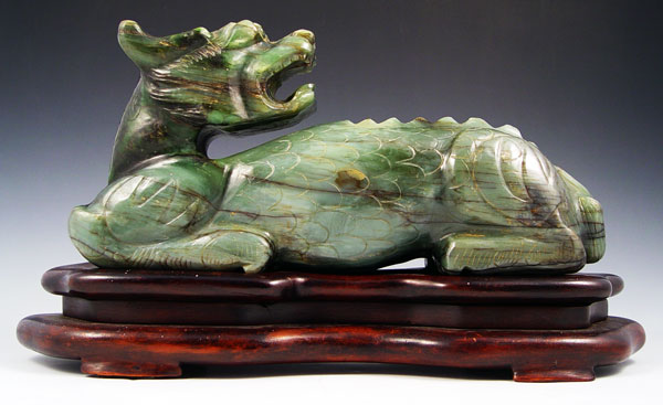 Appraisal: LARGE FIGURAL CARVED STONE MYTHICAL BEAST Blue green possibly jade