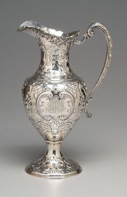 Appraisal: Large ornate sterling water pitcher baluster form with scroll and