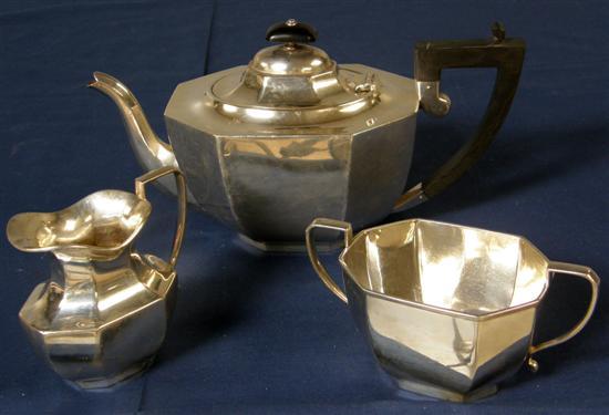 Appraisal: George VI silver three piece octagonal tea set comprising teapot