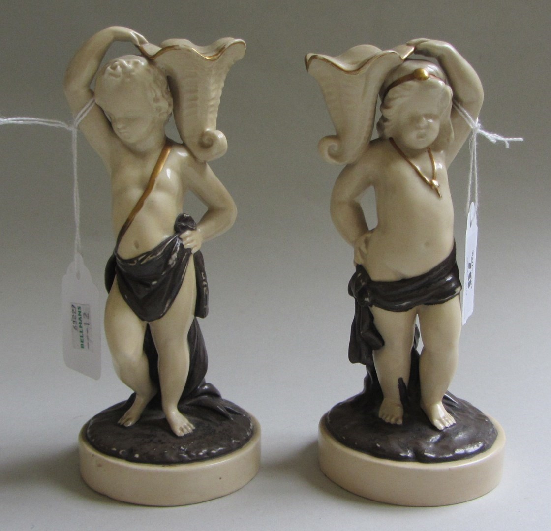 Appraisal: A pair of Worcester Kerr and Binns porcelain figural candlesticks