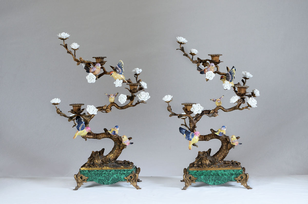 Appraisal: PAIR TOZAI DECORATIVE BIRD AND FLOWERS CANDELABRA Pair of light