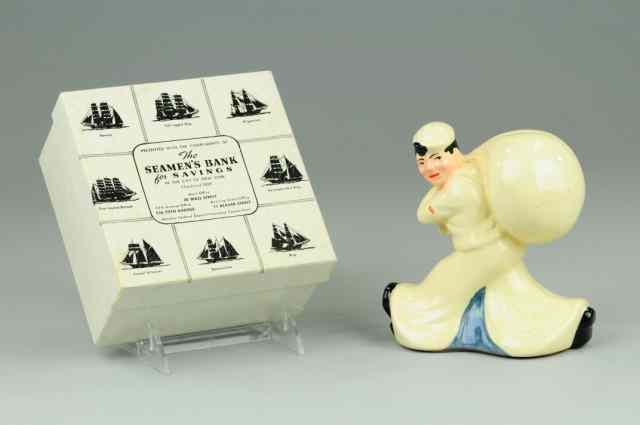 Appraisal: BOXED SEAMEN'S STILL BANK McCoy pottery classic depiction of sailor