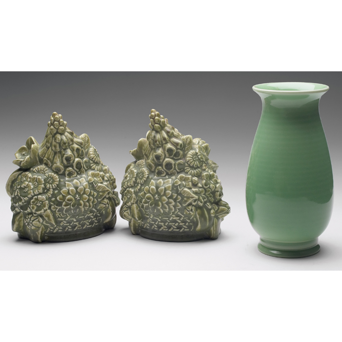 Appraisal: Rookwood bookends pair basket of flowers covered in a green