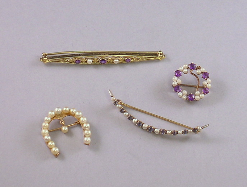 Appraisal: Four Small Brooches one kt gold and pearl horseshoe and