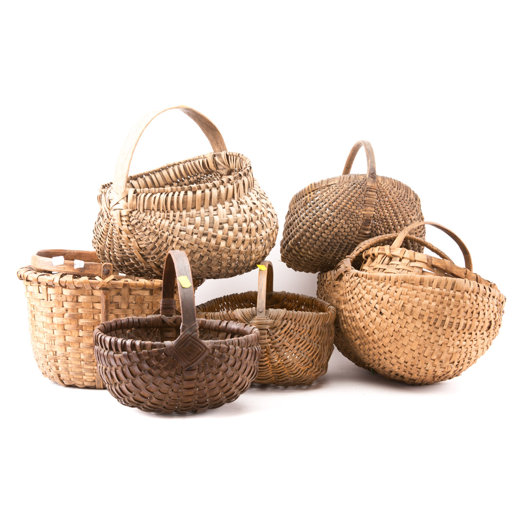 Appraisal: Seven assorted woven baskets and a Pure Ginger lidded container