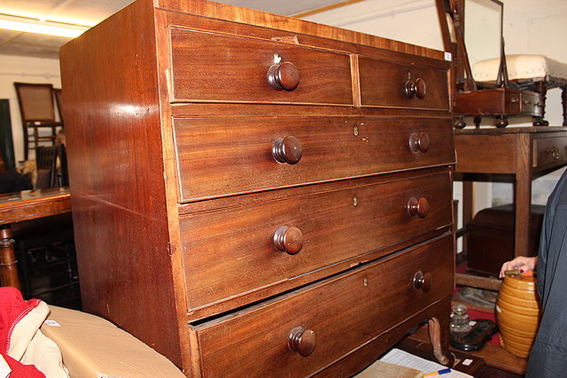 Appraisal: A TH CENTURY MAHOGANY CADDY TOP CHEST of two short