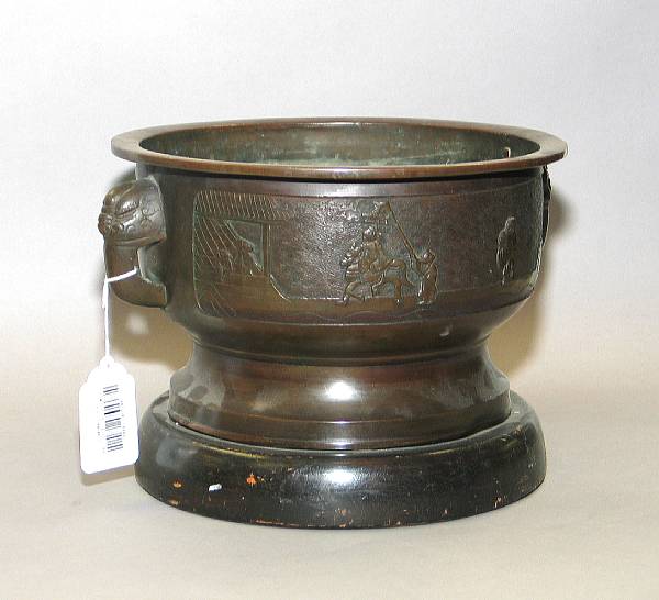 Appraisal: A circular bronze hibachi Cast with two rectangular figural panels