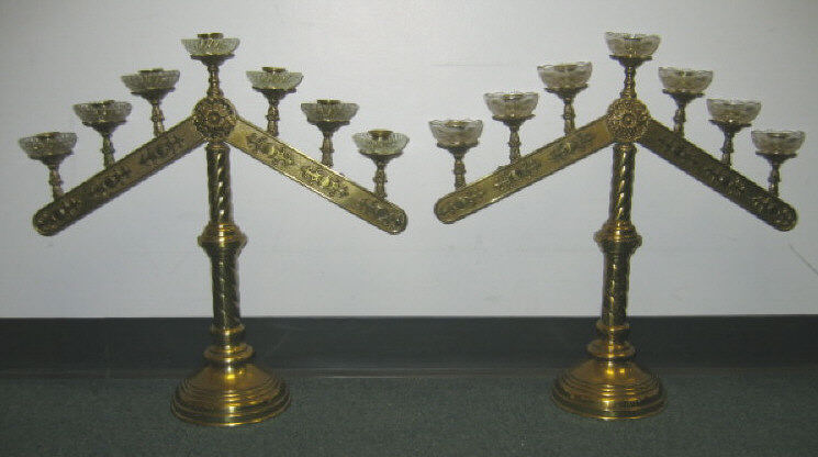 Appraisal: PAIR OF BRASS ALTAR CANDELABRA Each seven-light two adjustable arms