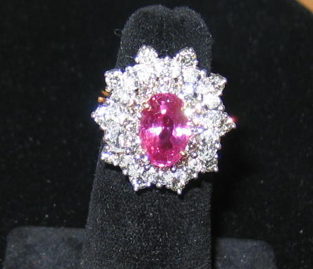 Appraisal: PINK SAPPHIRE AND DIAMOND RING k yellow gold and platinum